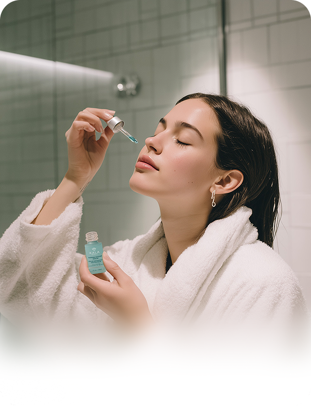 Woman relaxing in bed with an activated KALA LED face mask, using red light therapy for skin rejuvenation and wrinkle treatment.